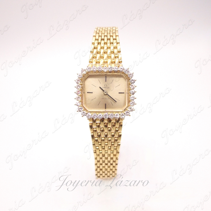 RELOJ OMEGA SRA. 
CCAJA CUADRADA 30X27MM
MAQUINARIA CUARZO OMEGA
31 DIAMANTES TALLA BRILLANTE VS 0.20CT C/U
67.8GR TOTAL

