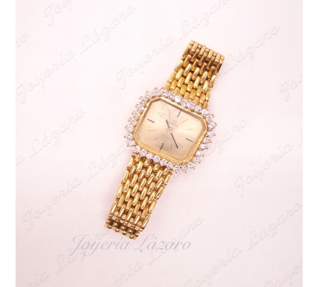 RELOJ OMEGA SRA.
CCAJA CUADRADA 30X27MM
MAQUINARIA CUARZO OMEGA
31 DIAMANTES TALLA BRILLANTE VS 0.20CT C/U
67.8GR TOTAL