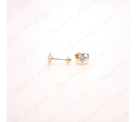 PEND. TORN. ORO 18 KTS FLOR CALADA EN MARCO CON CIRCO