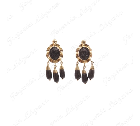 PEND. ORO 18KT SEMINUEVO, 3 CHUPONES NEGROS+CARA ARQUILLO                                           