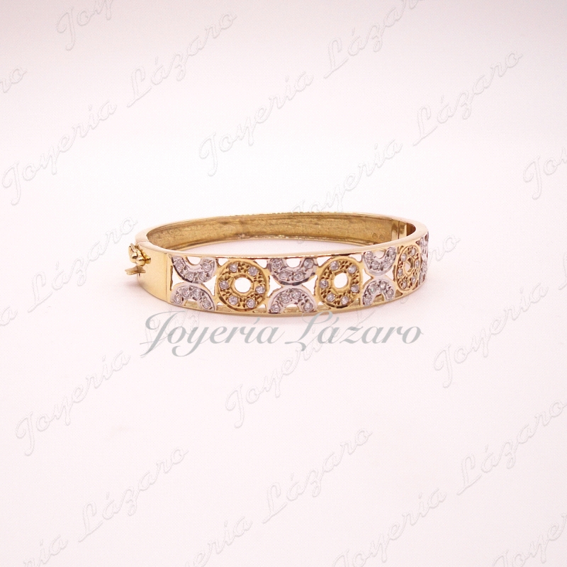 PULSERA 18KTS RIGIDA CALADA BICOLOR CIRCULOS CIRCO,57 mm INT.