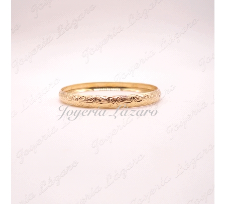 PULSERA 18KTS 1/2 CAÑA RIGIDA TALLADA ANCHO 0.8X6.7CM INT.