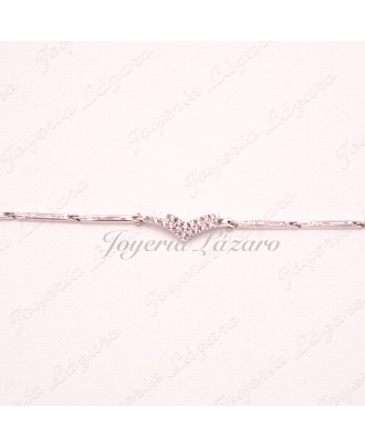 PULSERA 18KTS BL. PIEZAS ESLABONES MOTIVO EN CENTRO CON CIRCO.