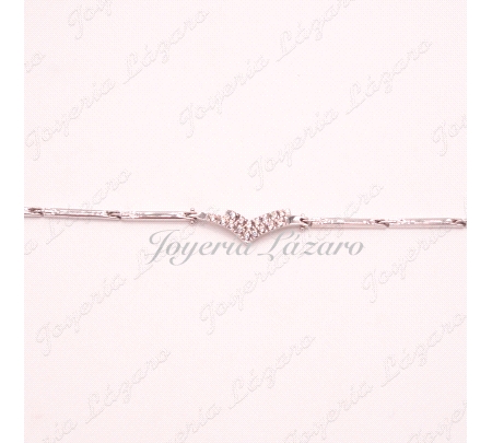 PULSERA 18KTS BL. PIEZAS ESLABONES MOTIVO EN CENTRO CON CIRCO.