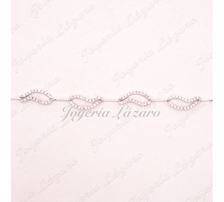 PULSERA 18KTS BL.CIRCO. MOTIVOS CALADOS CON CIRCO Y LAMINAS ENTRE PIEZ