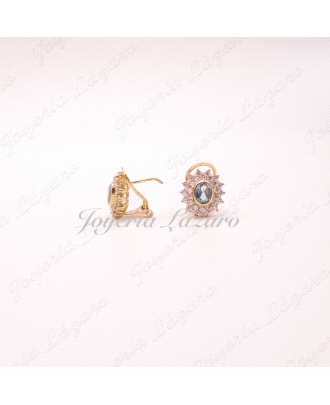 PEND. 18KTS OMEGA ROSETON AGUAMARINA