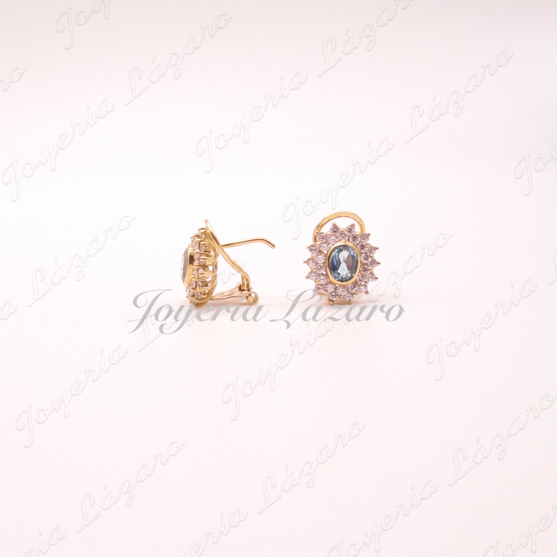 PEND. 18KTS OMEGA ROSETON AGUAMARINA