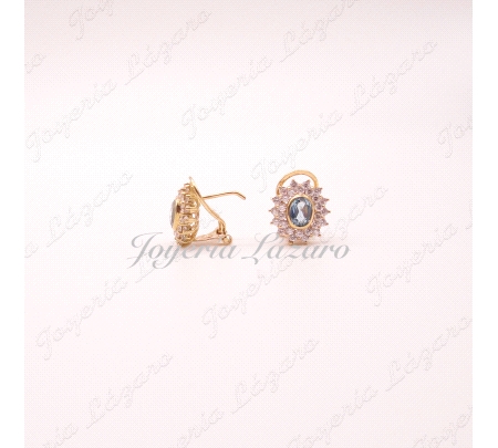 PEND. 18KTS OMEGA ROSETON AGUAMARINA