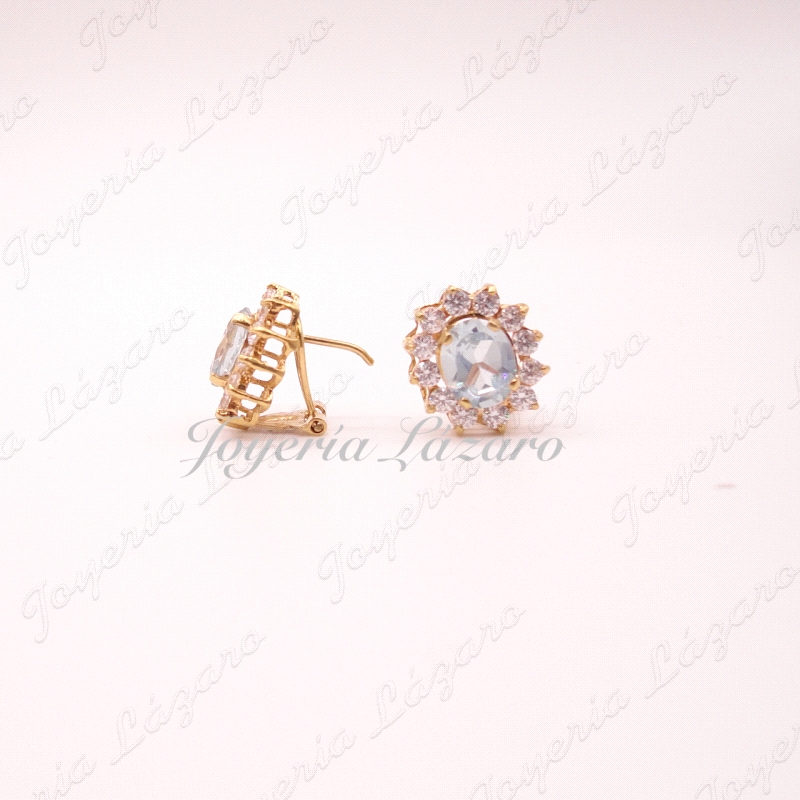 PEND. 18KTS OMEGA ROSETON AGUAMARINA