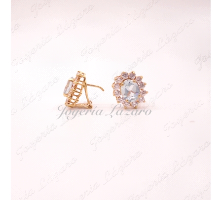 PEND. 18KTS OMEGA ROSETON AGUAMARINA