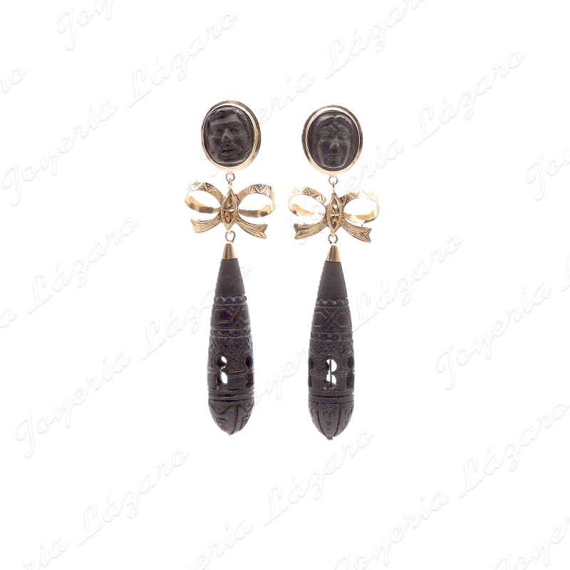 PEND. ORO 18 KTS EBANO/PALOSANTO 80MM, CARAS+LAZO+CHUPON MACIZO