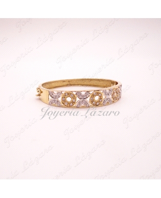 PULSERA 18KTS RIGIDA CALADA BICOLOR CIRCULOS CIRCO,57 mm INT.