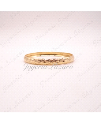 PULSERA 18KTS 1/2 CAÑA RIGIDA TALLADA ANCHO 0.8X6.7CM INT.