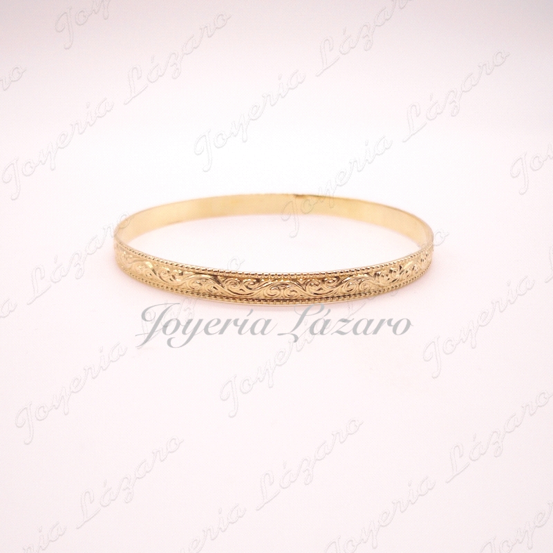 PULSERAS 18KTS RIGIDA MACIZA LABRADA,65mm INT. 5'5 ANCHO