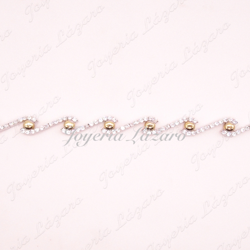 PULSERA 18KTS BICOLOR CIRCONITAS EN ONDAS+BOTONES