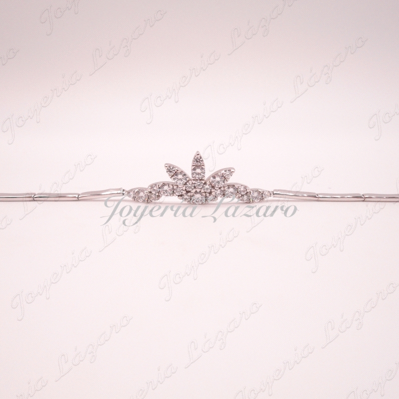 PULSERA 18KTS BL.   SEMIRIGIDA MOTIVO FLOR CON CIRCO EN CENTRO