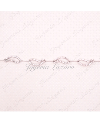 PULSERA 18KTS BL.CIRCO. MOTIVOS CALADOS CON CIRCO Y LAMINAS ENTRE PIEZ