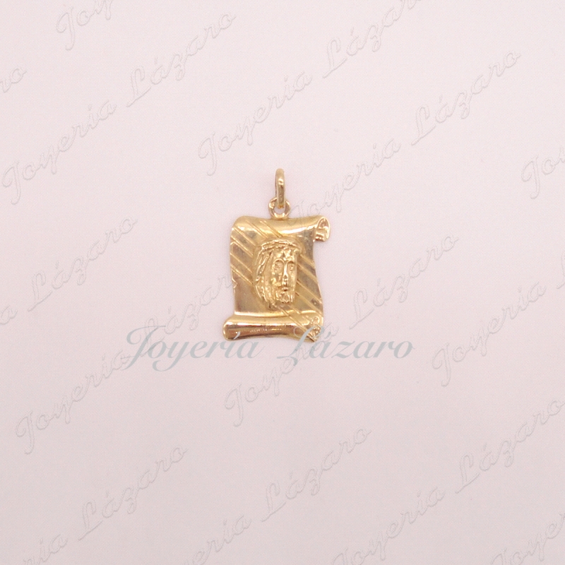 MEDALLA 18KTS PERGAMINO. ROSTRO CRISTO