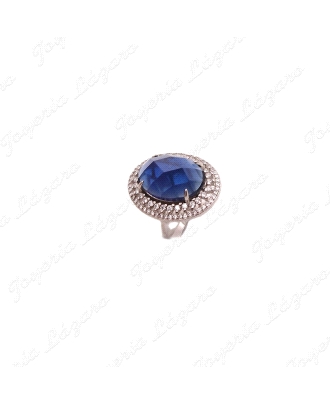 SORTIJA PLATA CIRCO AZUL 4 GARRAS FACETADA ,2 VUELTAS OVAL CIRCONITAS