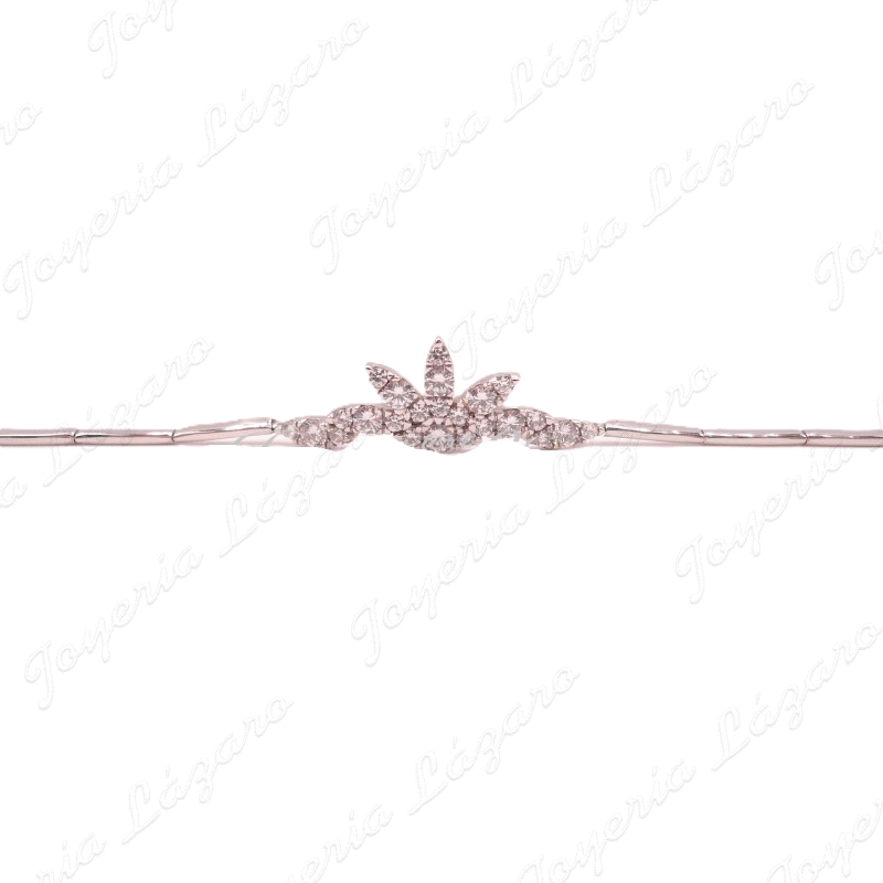 PULSERA 18KTS BL.   SEMIRIGIDA MOTIVO FLOR CON CIRCO EN CENTRO